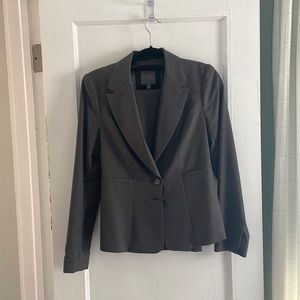 Charcoal grey pinstripe suit.